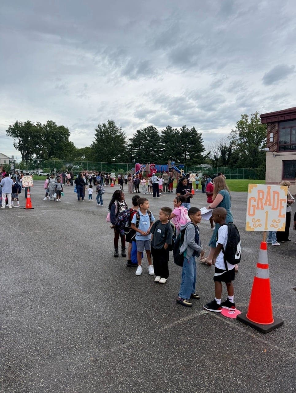 Students arrive for the first day of school at Grover Cleveland School in Rahway.